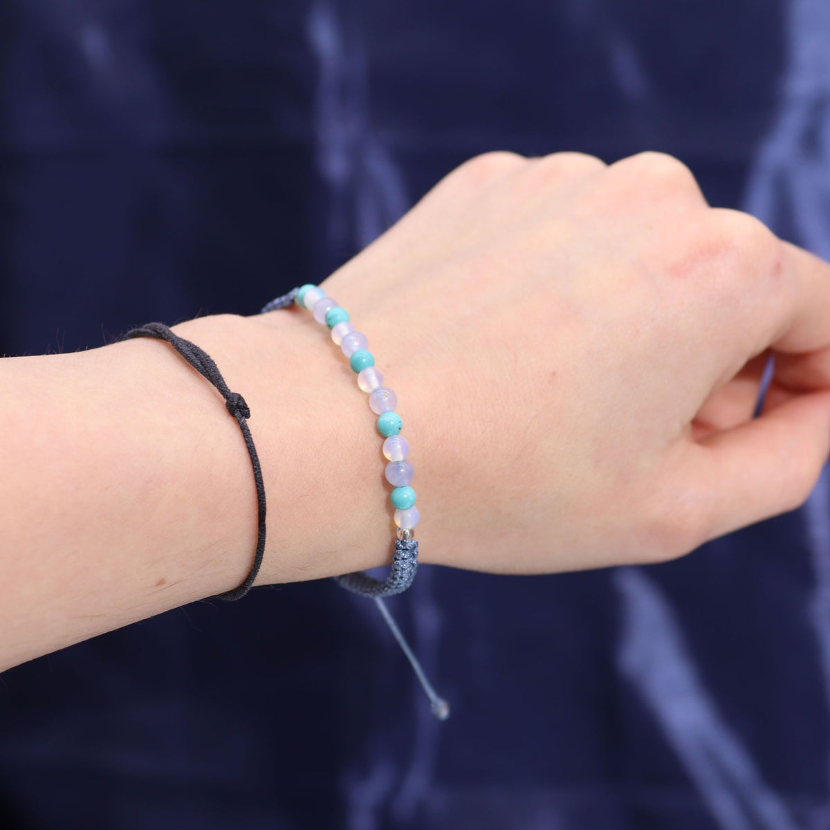 Sternzeichen-Kristallkerze mit Edelsteinarmband und Kartenlegung – Fische